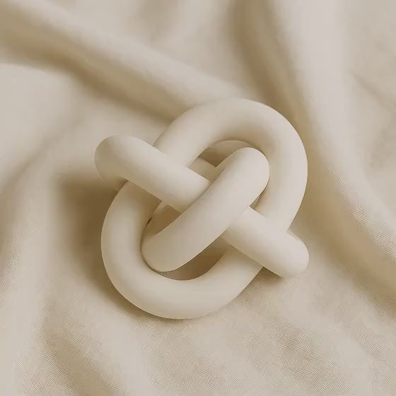 Minimalist walnut wood ring sculpture with triple circle design for modern home décor
